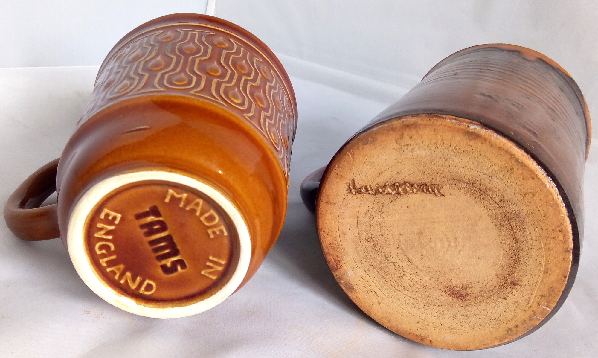 Duo of French-English brown and terracotta cups