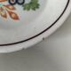 Pair of antique soup plates with hand-painted grape decoration