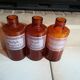 Lot de trois flacons de pharmacie