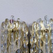 Modern mid-century crystal wall sconces in the shape of a drop by Orrefors by Carl Fagerlund.