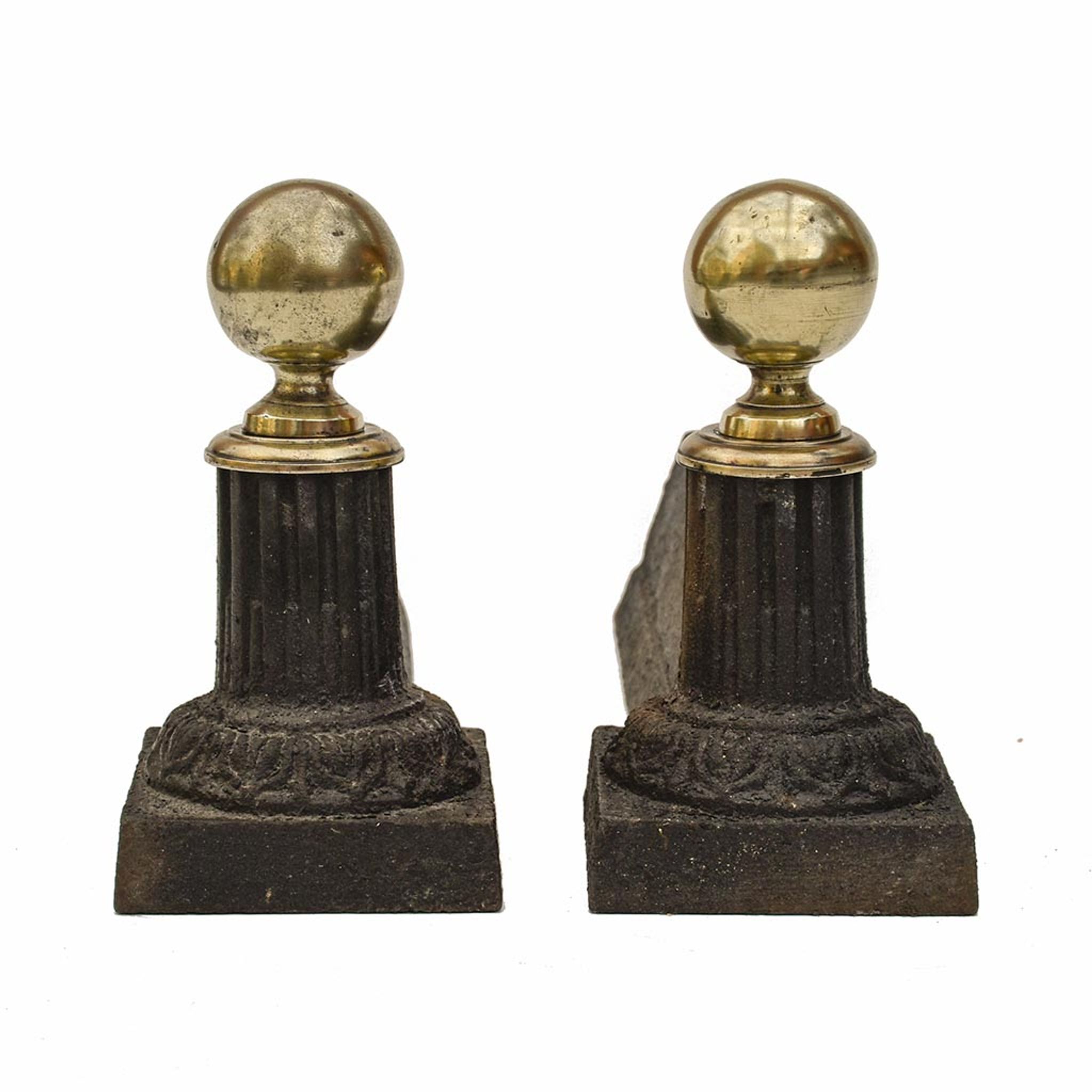 Pair of cast iron channels and brass ball 19th antique fireplace accessory