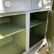 Robust country sideboard with country charm with marble handles in gray and white chalk