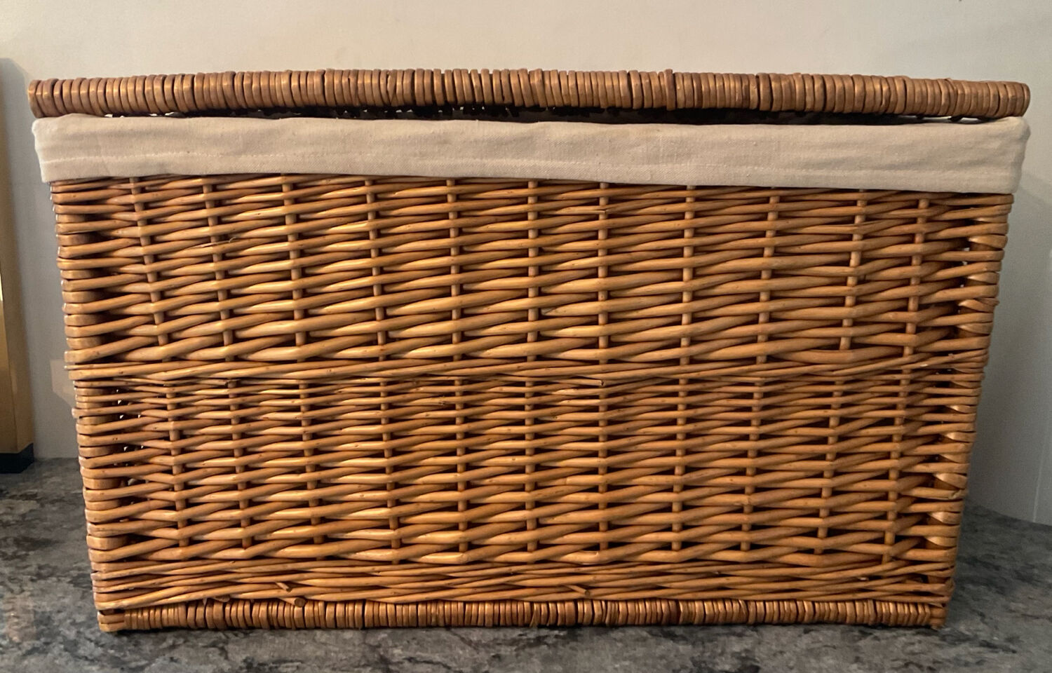 Woven wicker vintage suitcase