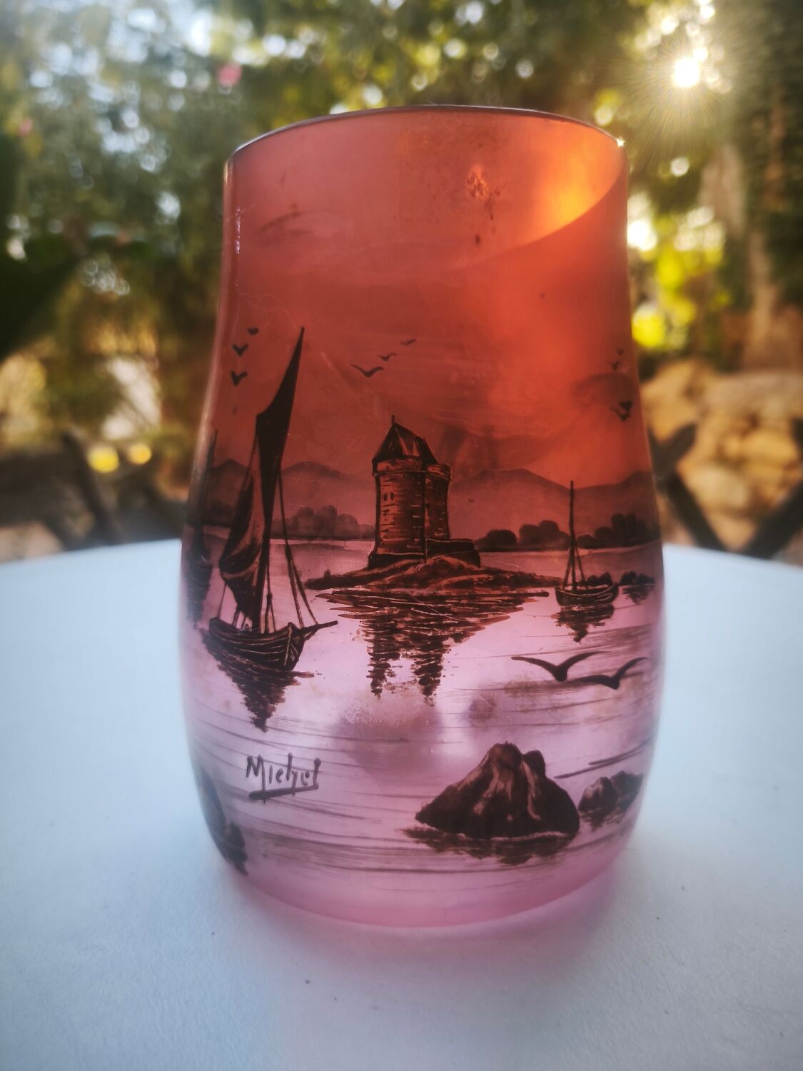 Vase signed Michel with a lakeside decoration.