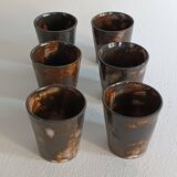 A bottle and six ceramic cups by Gérard Hofmann Vallauris 1950.