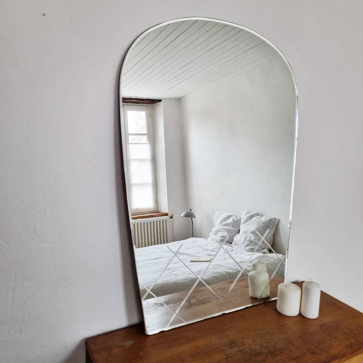 Large vintage beveled arch mirror