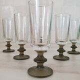 6 small green foot flutes in the Timo Sarpaneva style