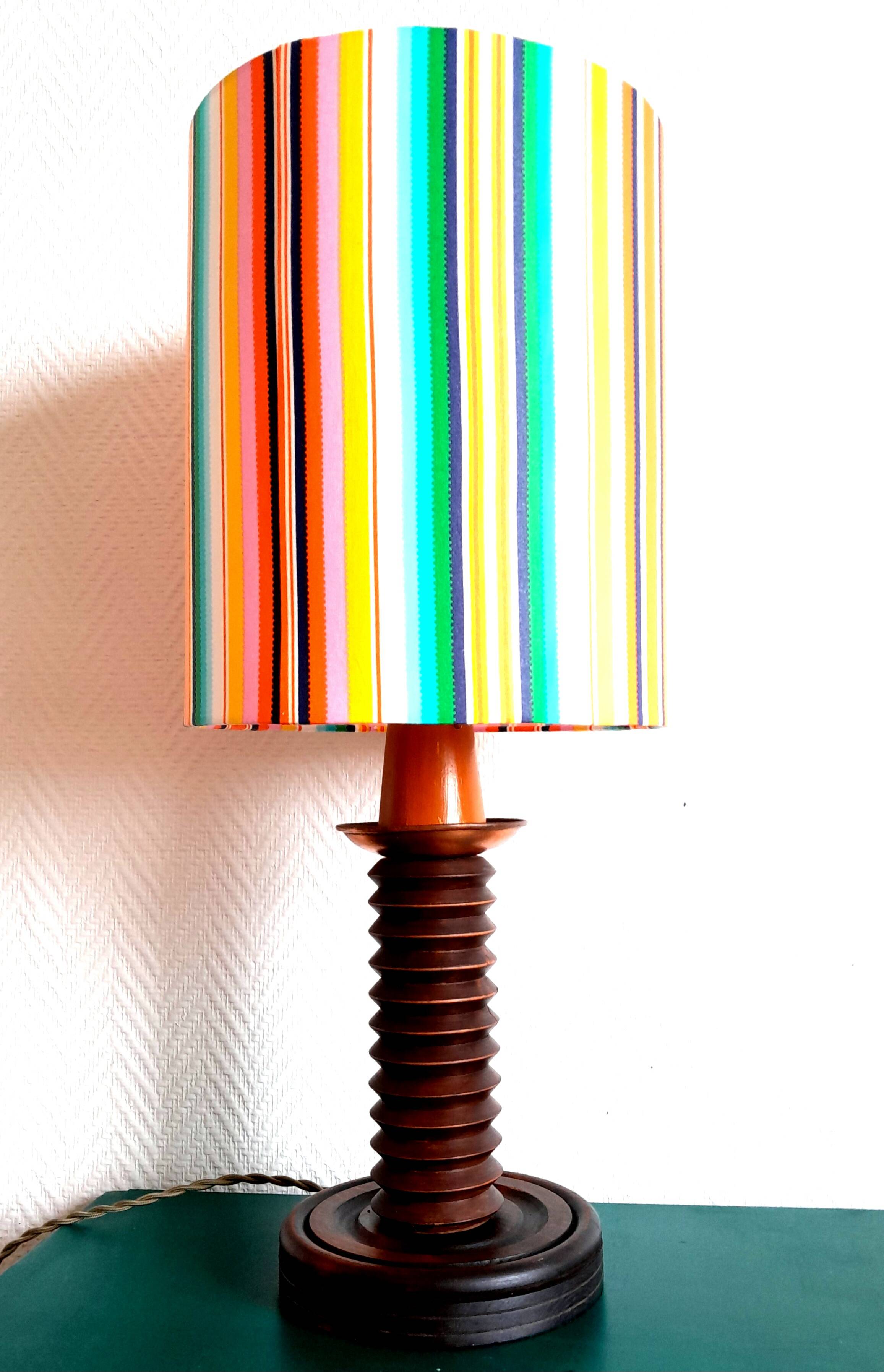 Wooden lamp with striped lampshade