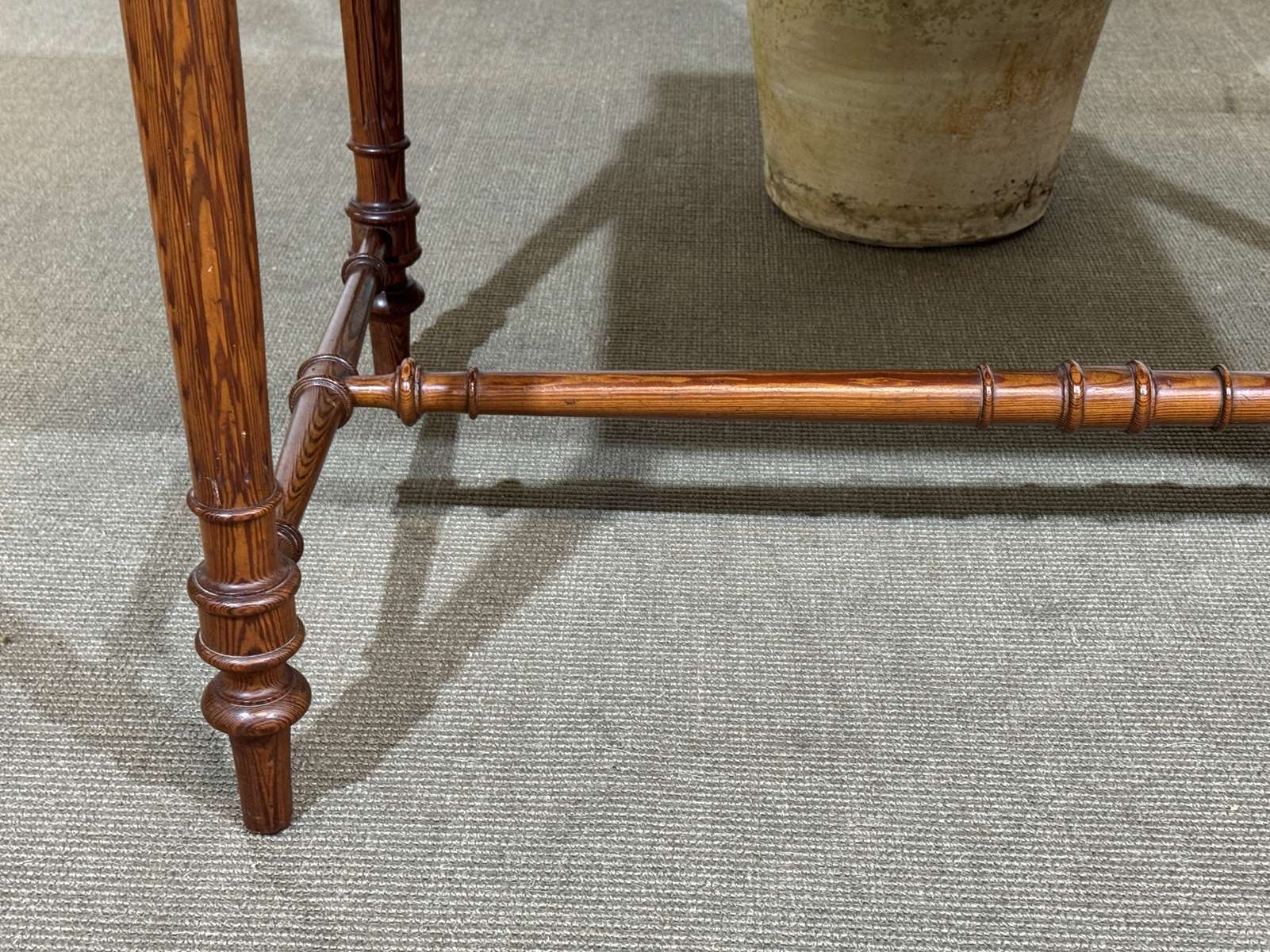 Desk table from the early 20th century in pitch pine.