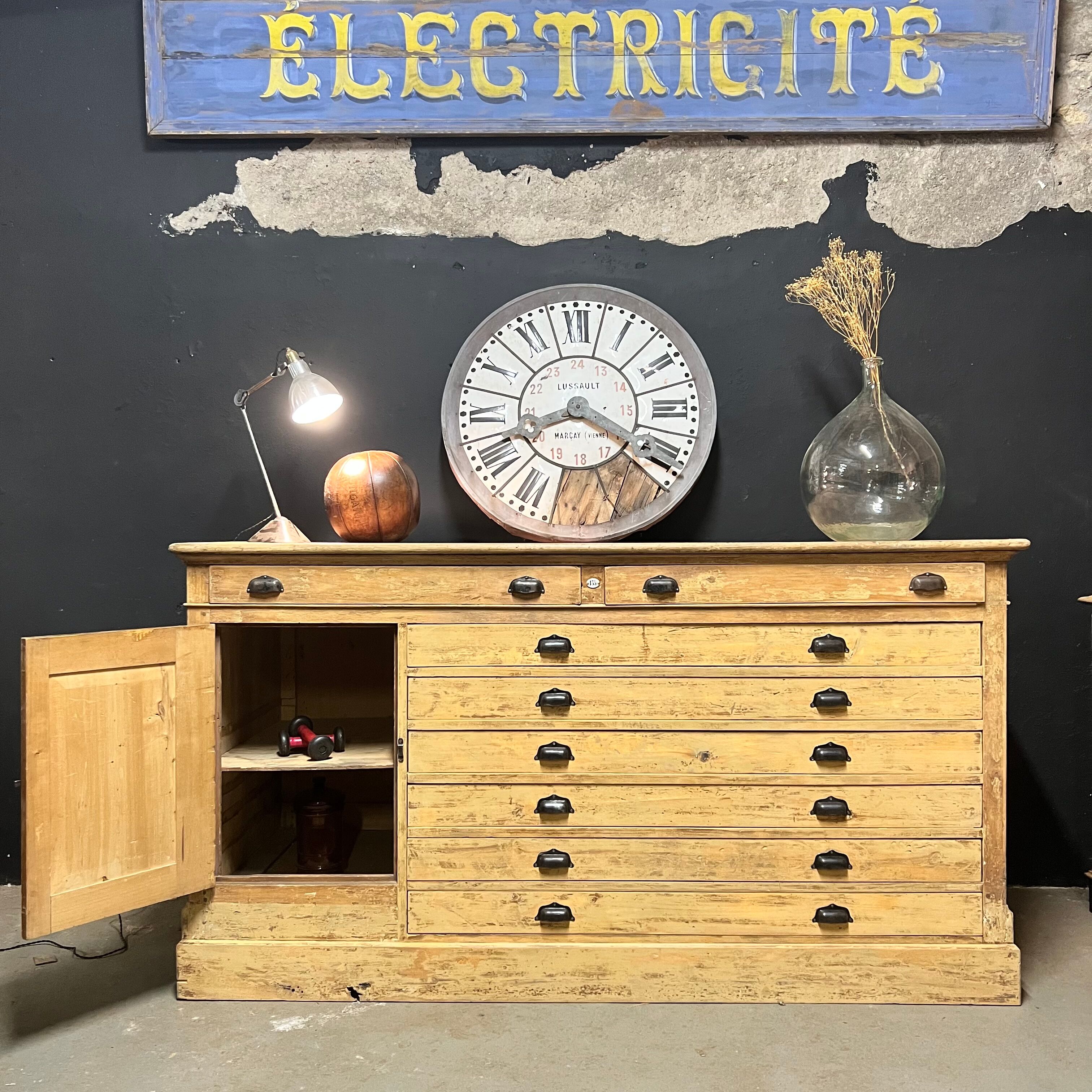 Old piece of furniture by trade with an architect's plan