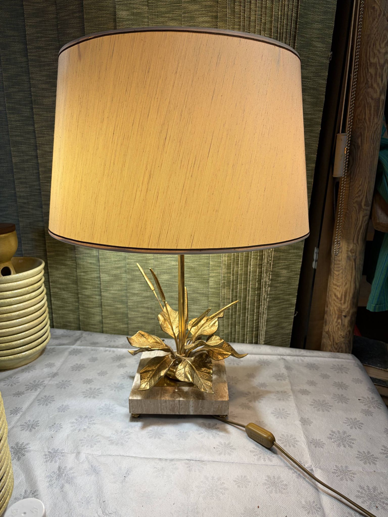 Bronze and travertine water lily lamp attributed to Maison Charles, circa 1970.