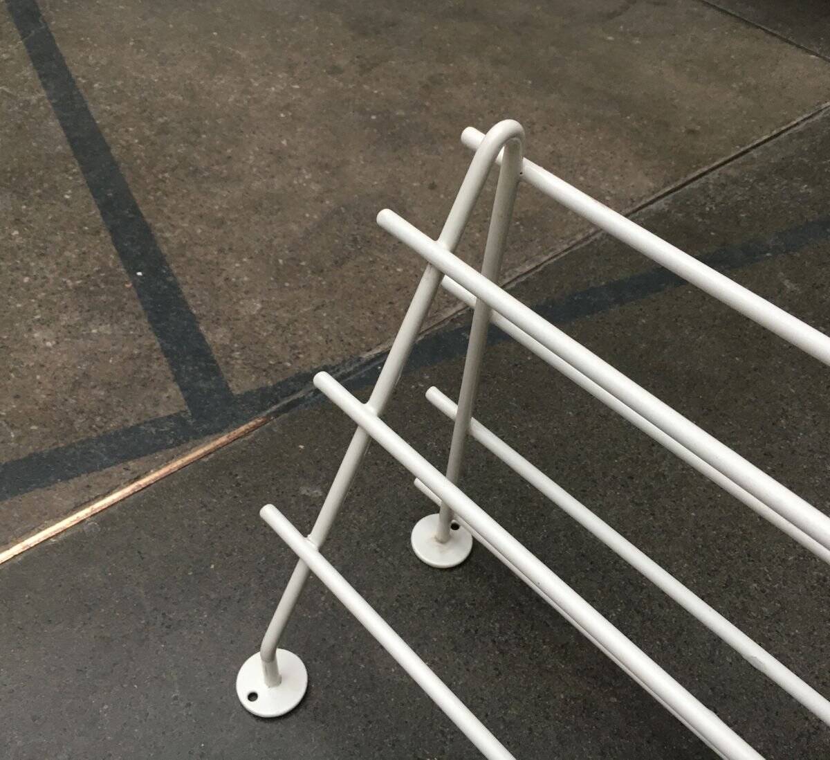 Mid-century modern minimalist metal coat rack from the 1960s.