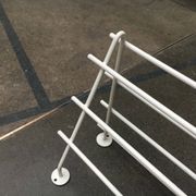 Mid-century modern minimalist metal coat rack from the 1960s.