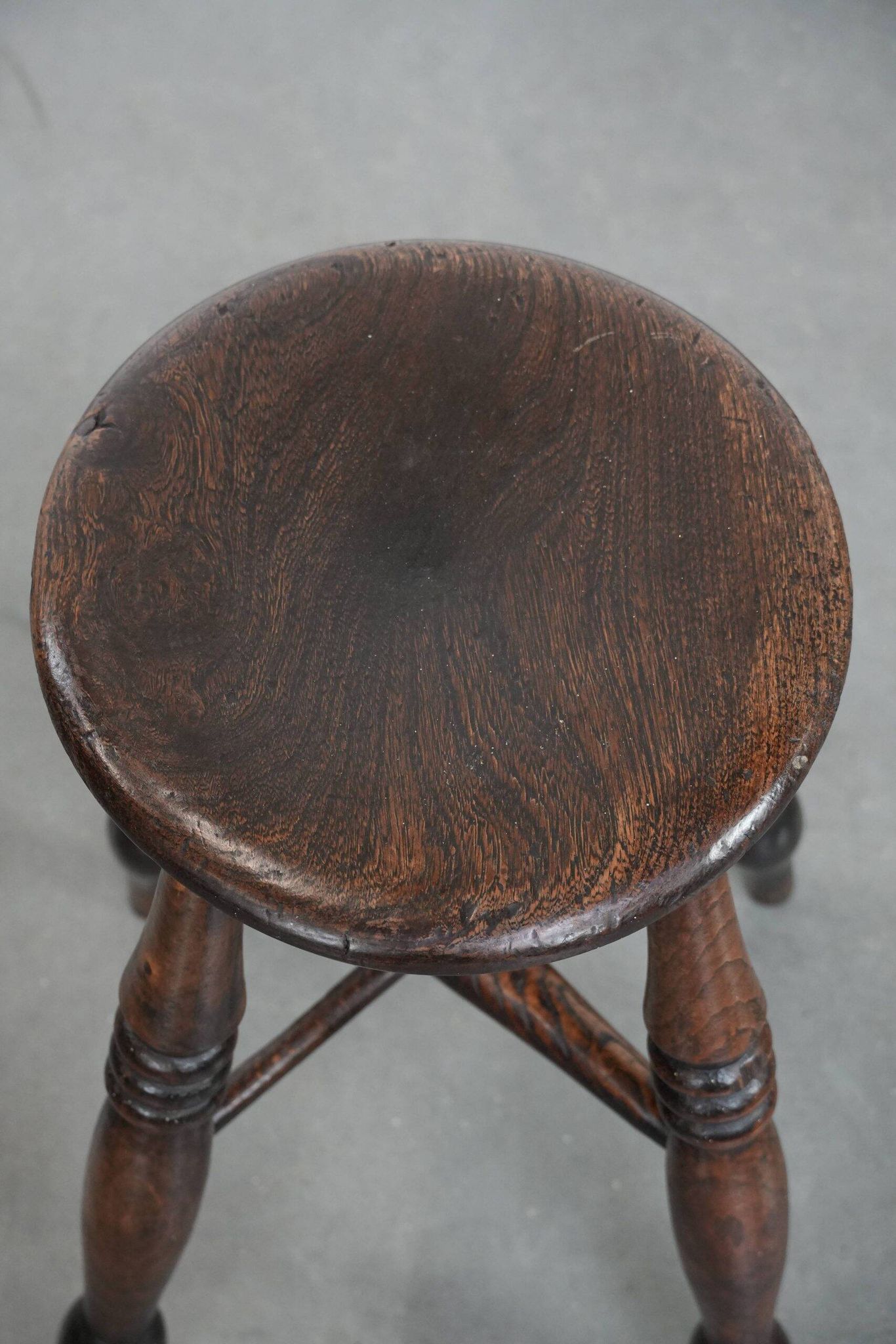 Antique English Windsor stool from the 18th century with a great patina