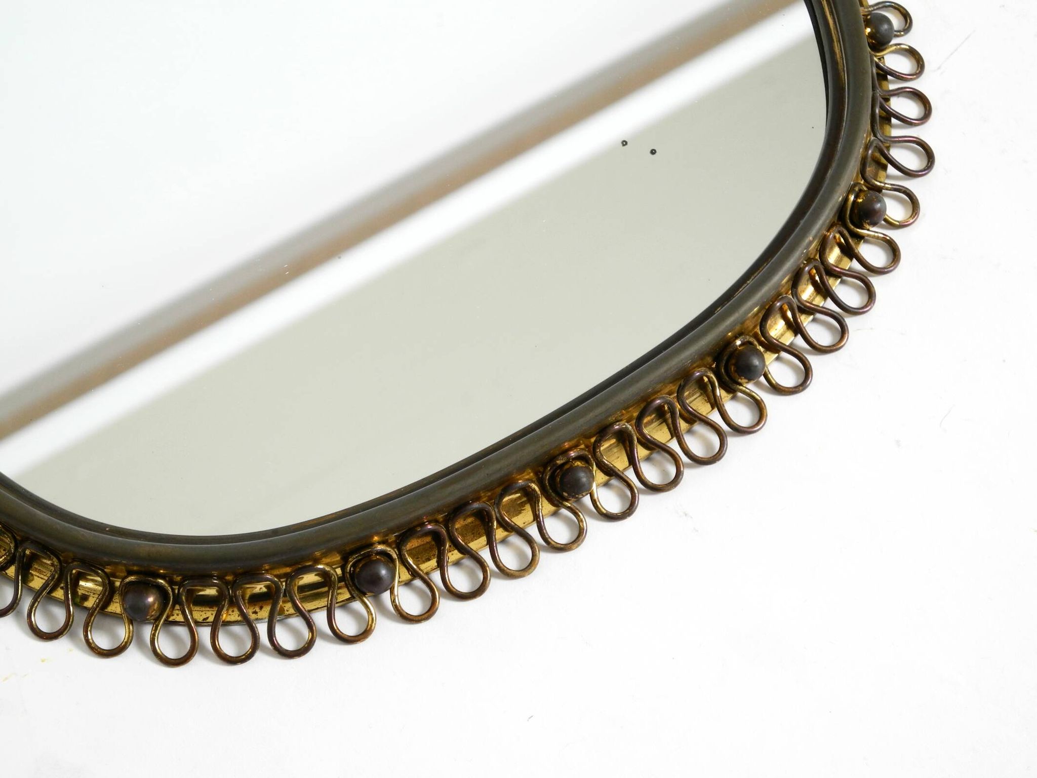 Mid century brass wall mirror by Josef Frank for Svenskt Tenn Sweden