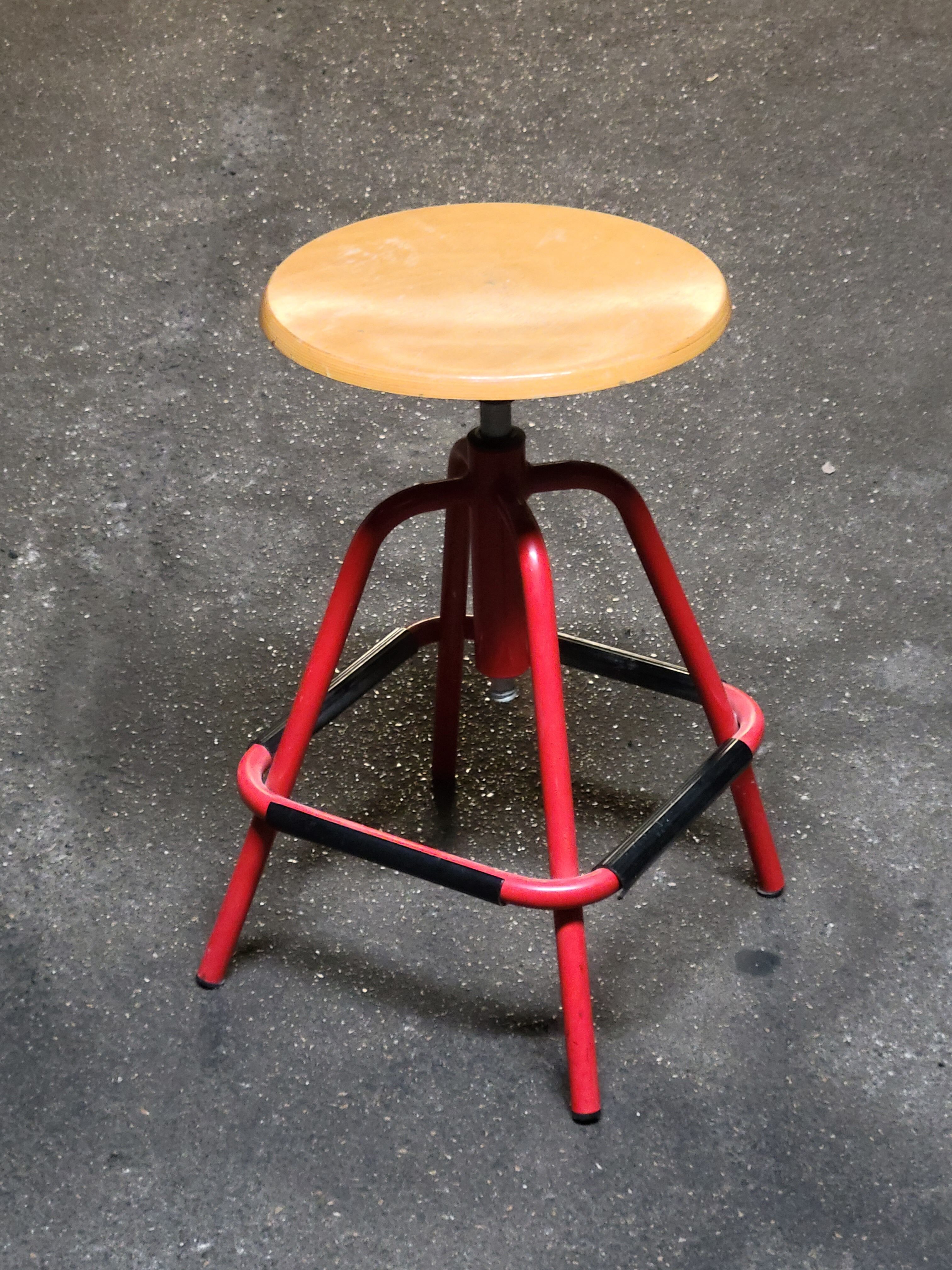 Red stool with industrial vintage screw 80s