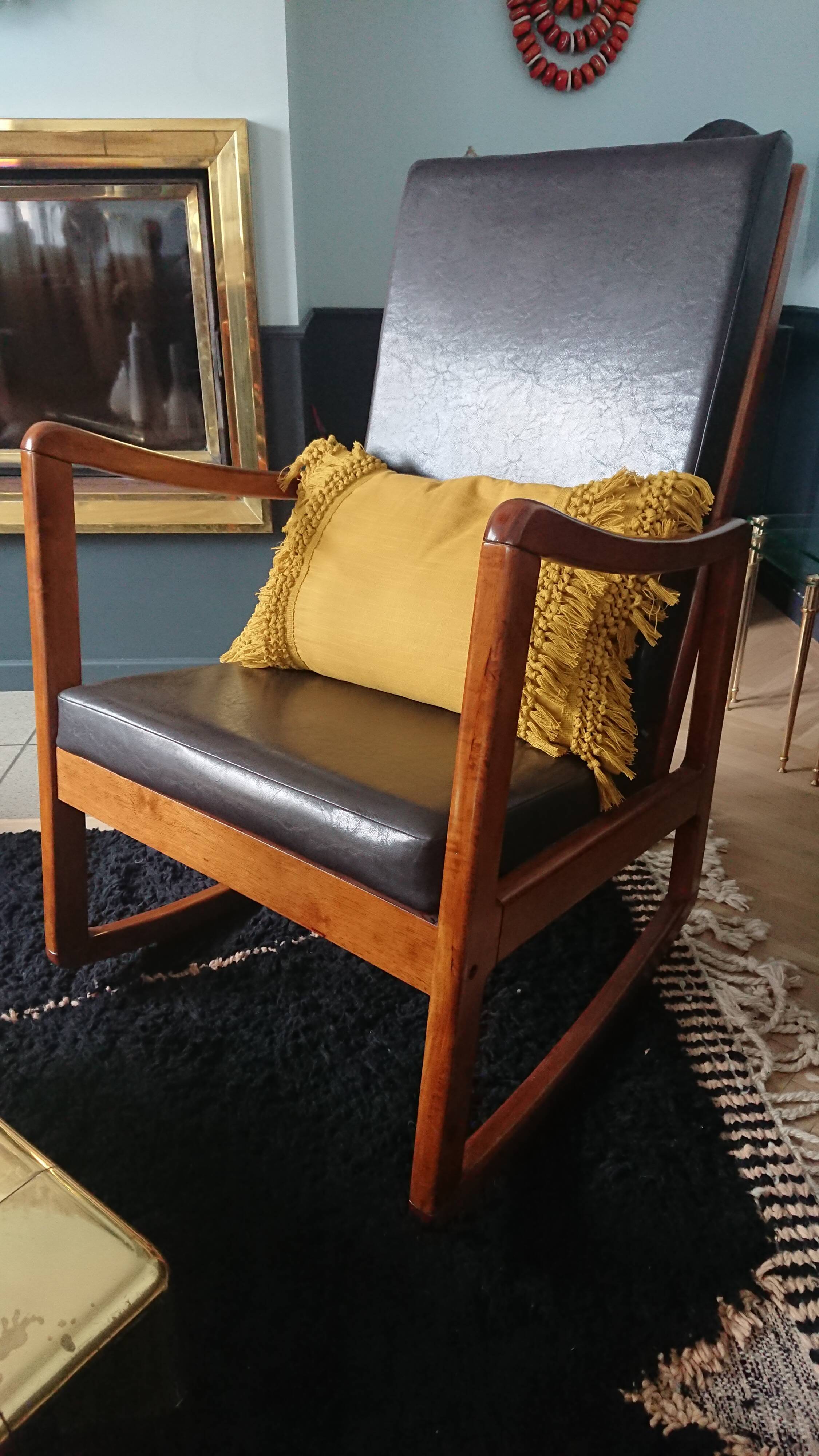 Rocking-chair in teak and skai