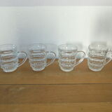 4 transparent glass mugs