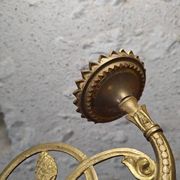 Set of two large antique brass candle wall sconces.