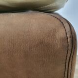 Fauteuil avec pouf en cuir et daim