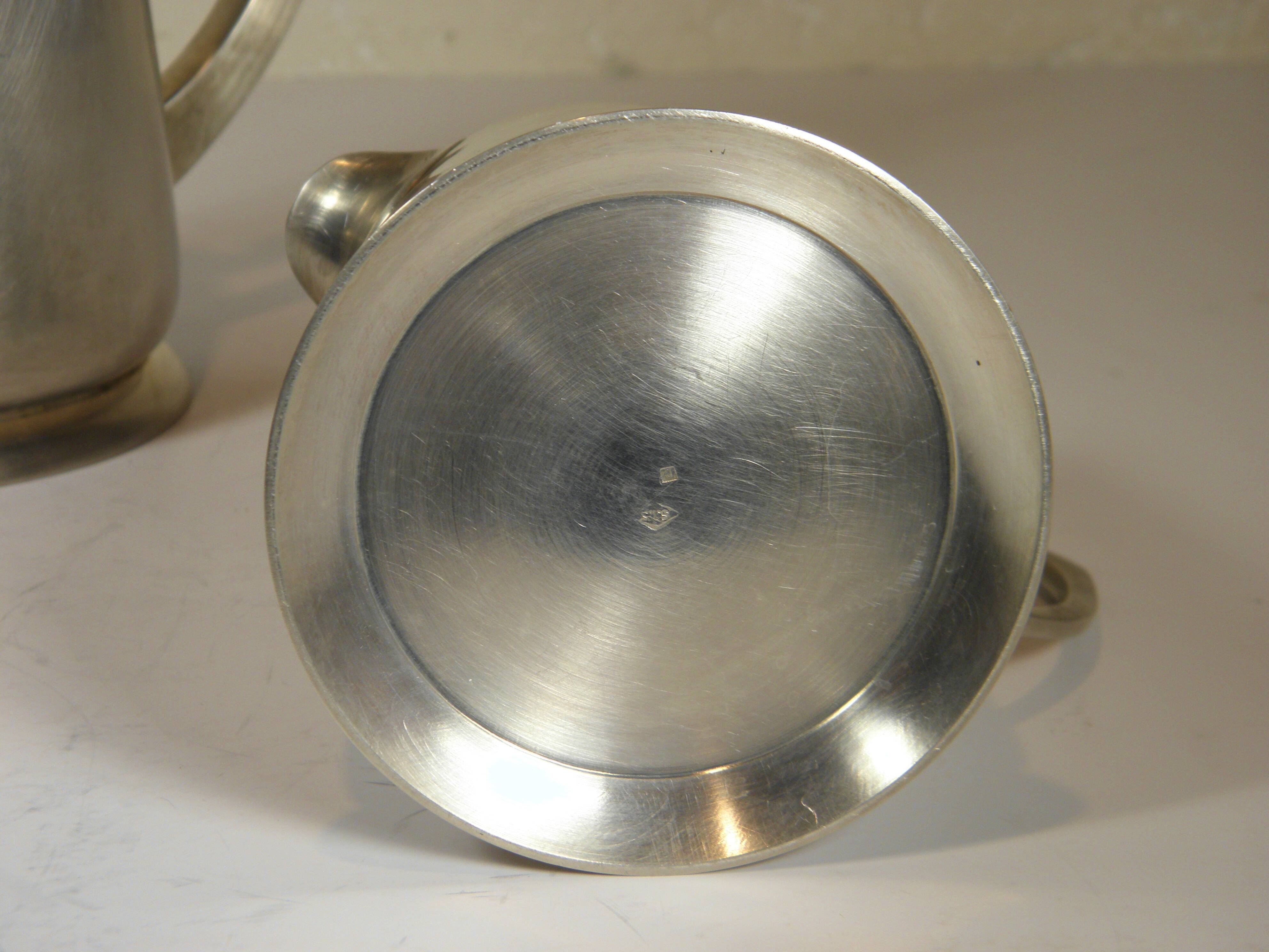 Silver-plated metal coffee pot and milk jug