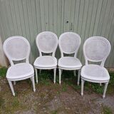 4 old wooden and cane chairs