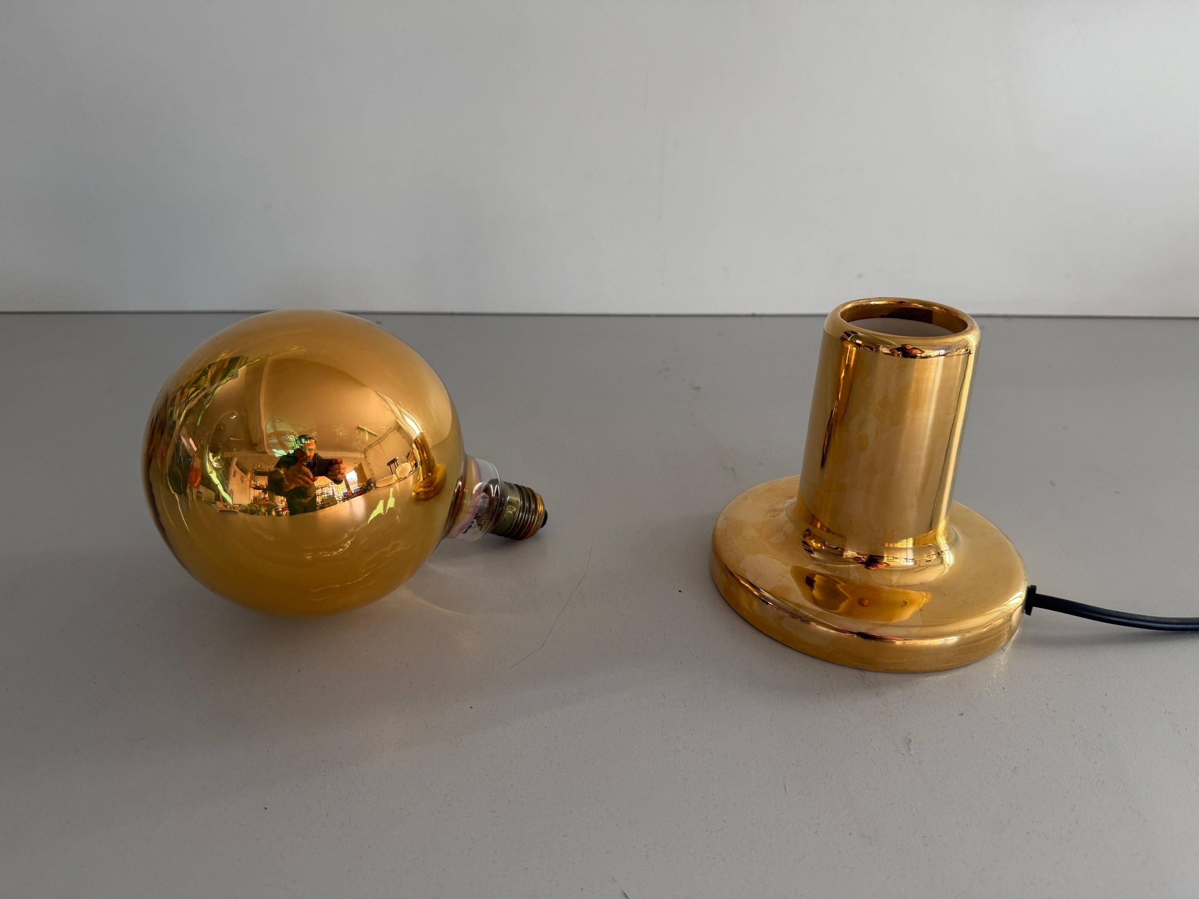 Simple table lamp in gilded porcelain by Philips NTD, 1960s, Germany.