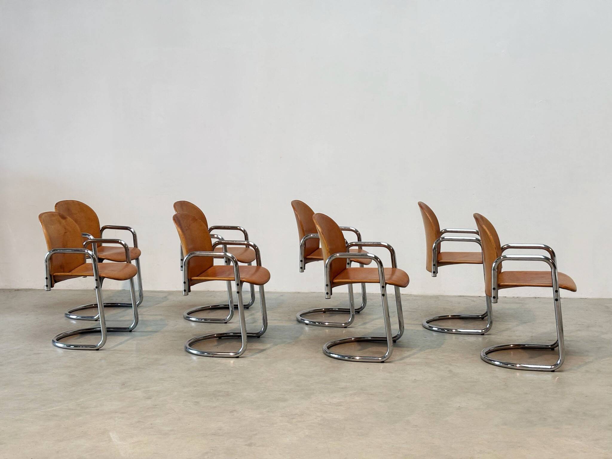 Set of eight cognac leather Dialogo Dessau dining chairs by Afra E Tobia Scarpa