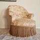 Antique flowered toad armchair with fringes