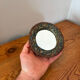 Round mirror in gilded enamelled ceramic with inlay