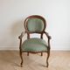 Louis XV Voltaire armchair in wood and green fabric