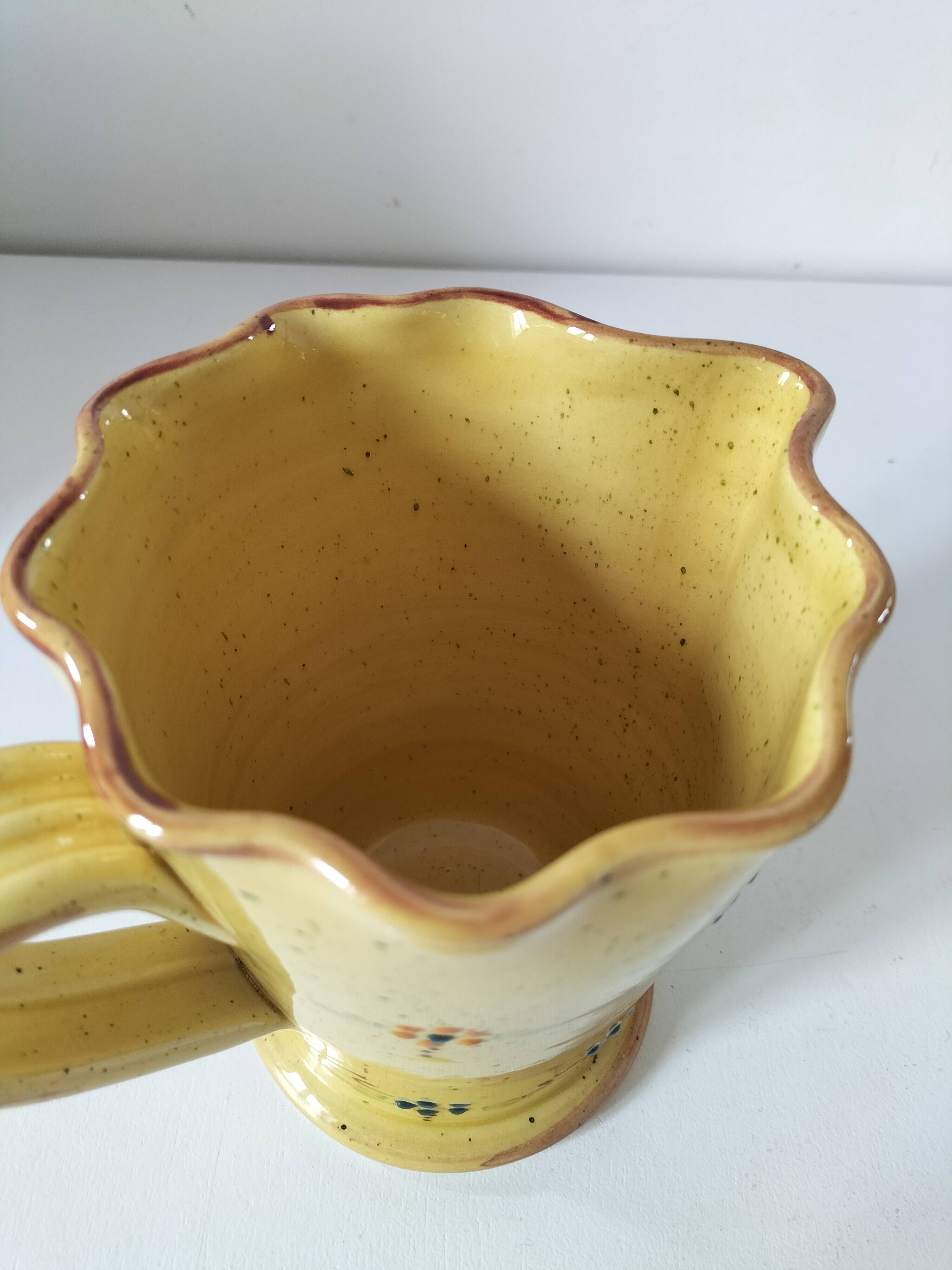 JP Daniel handmade earthenware pitcher – floral decoration on a yellow background