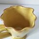 JP Daniel handmade earthenware pitcher – floral decoration on a yellow background