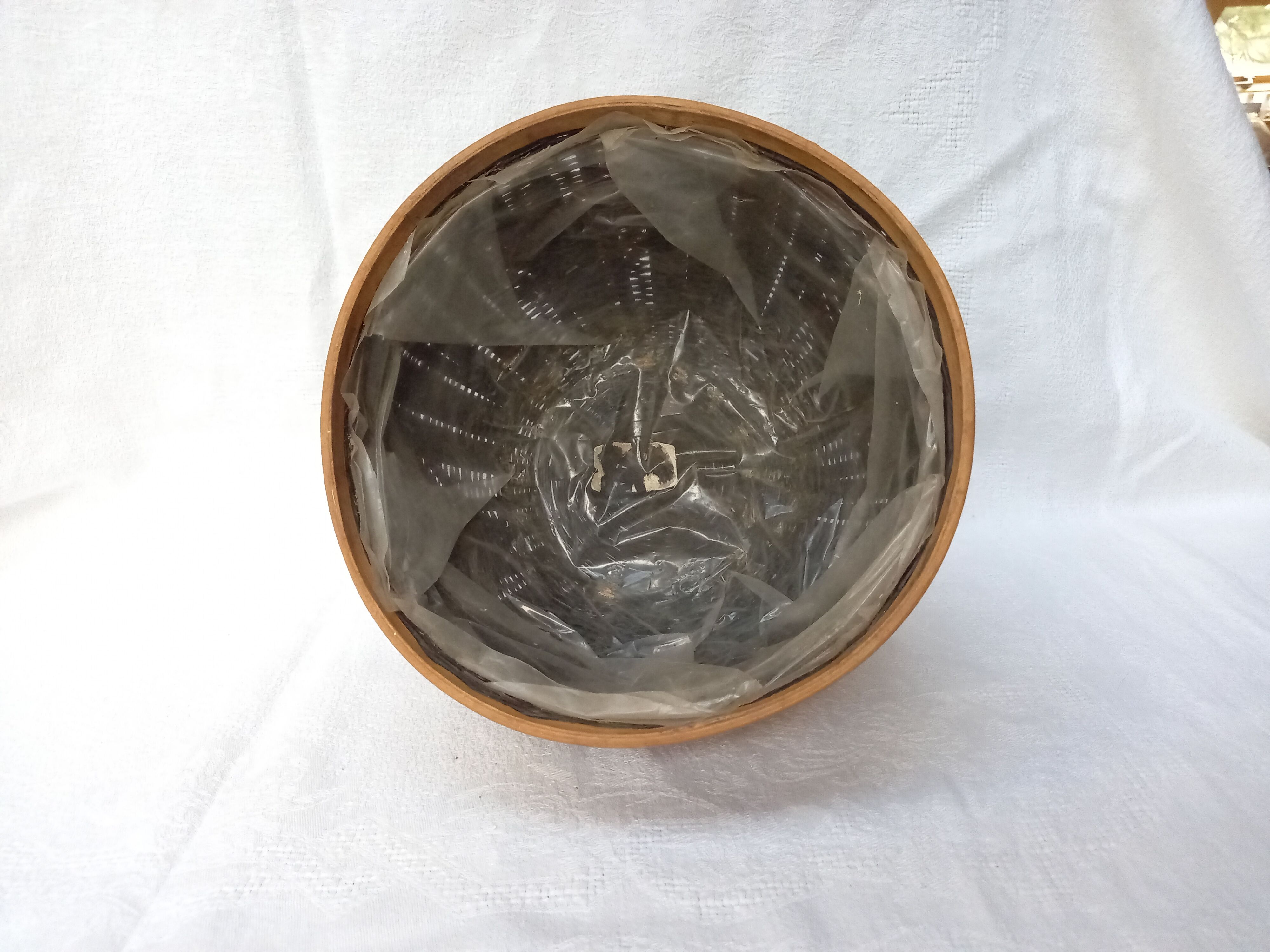 Braided wicker pot cover