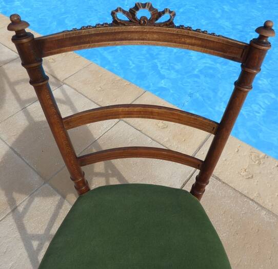 1 solid wood chair with green velvet top and nails