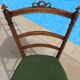 1 solid wood chair with green velvet top and nails