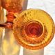 9 orange-stemmed wine glasses circa 1970