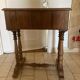 Small table with two drawers.