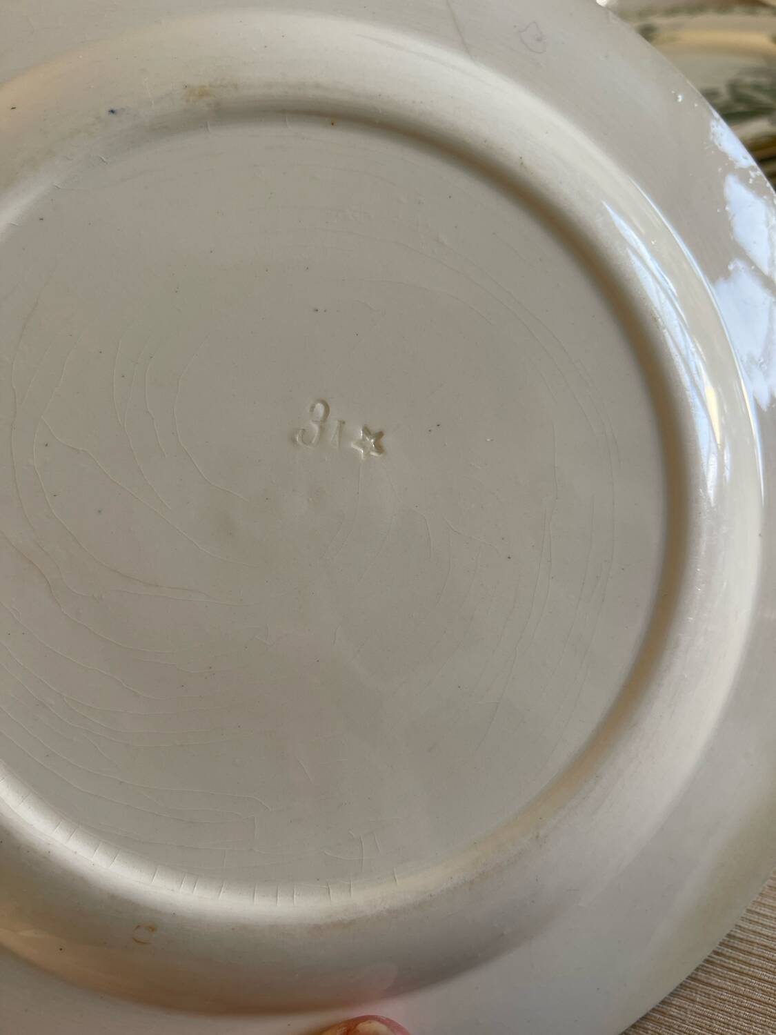 7 flat plates made of ironstone.