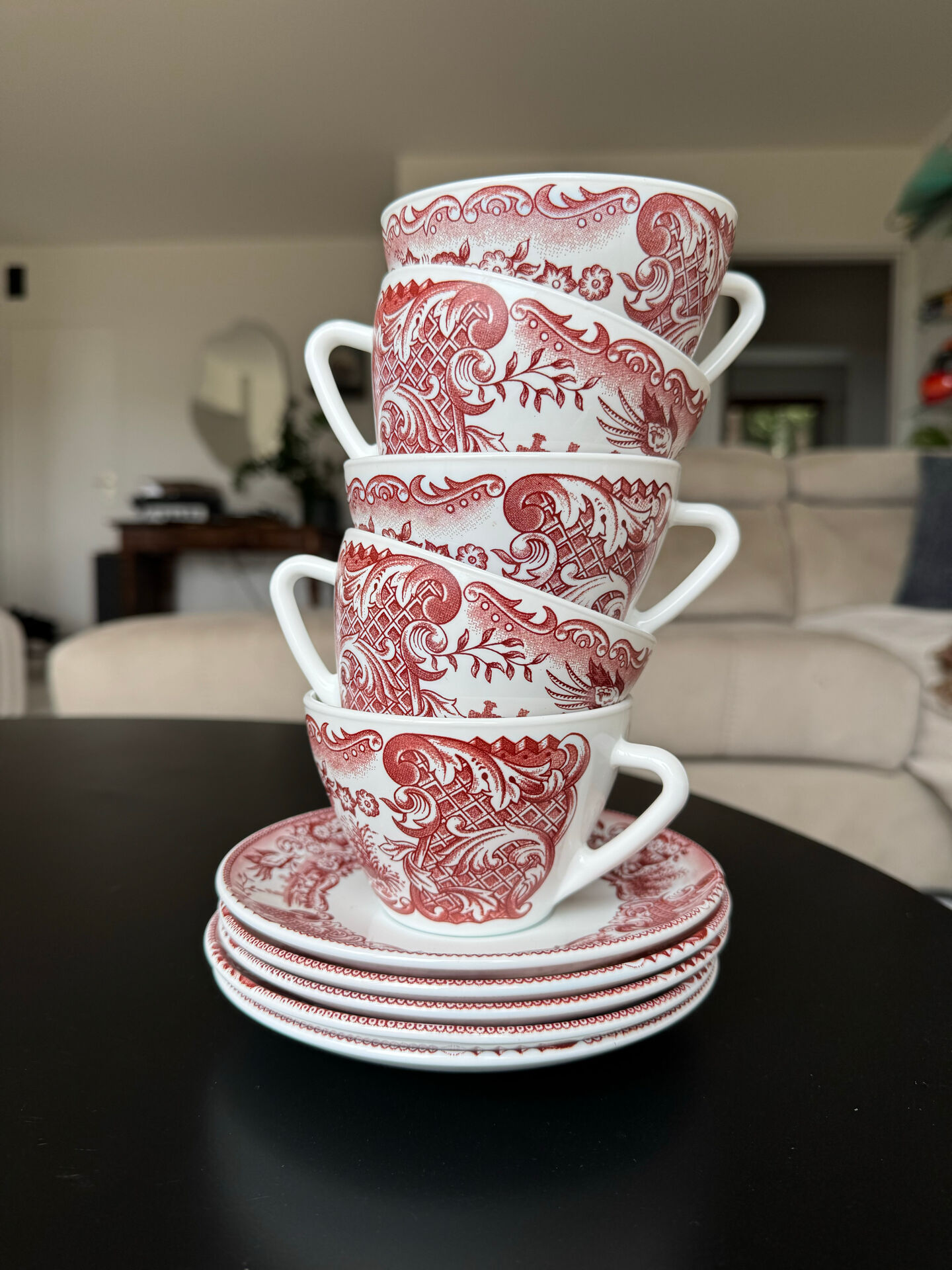 5 cups and 5 saucers Rivanel in red opaline from the 1970s.