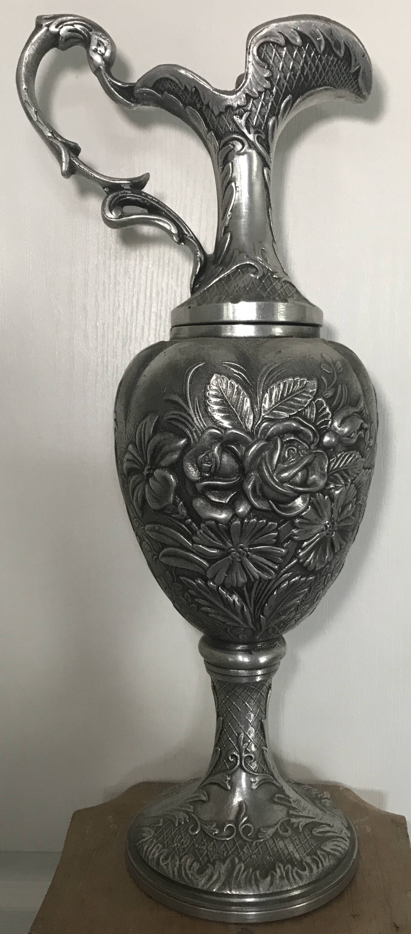 Ewer, Mauro Manetti art foundry, floral embossed decoration and bird's head handle