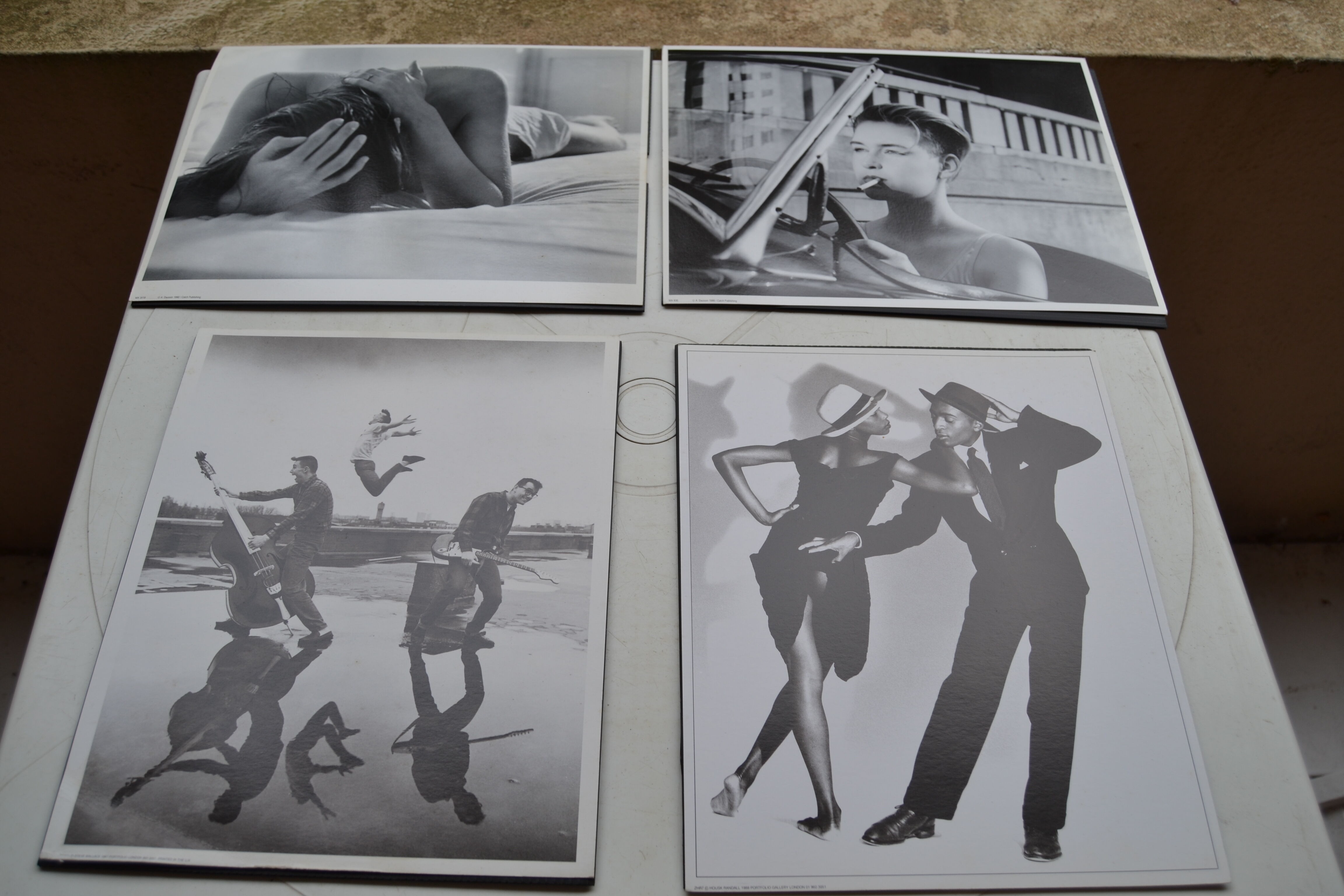 Lot of 4 photos from the 1960s, 1970s, 1980s of Tushita editions of artists (Armstrong Roberts, Cyril Bernard, Housk Randall)