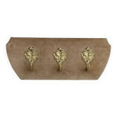 Vintage velvet coat rack with brass hooks
