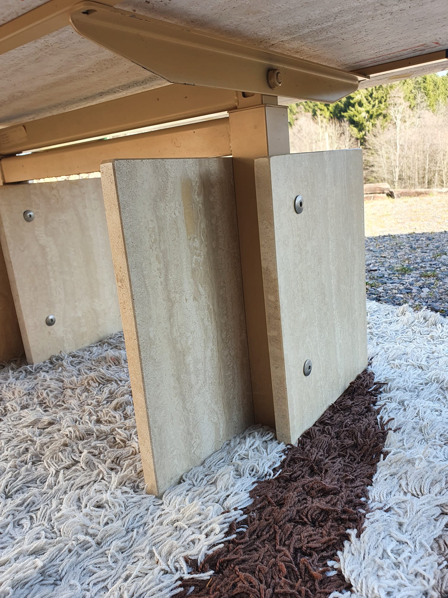 Adjustable travertine coffee table eye shape