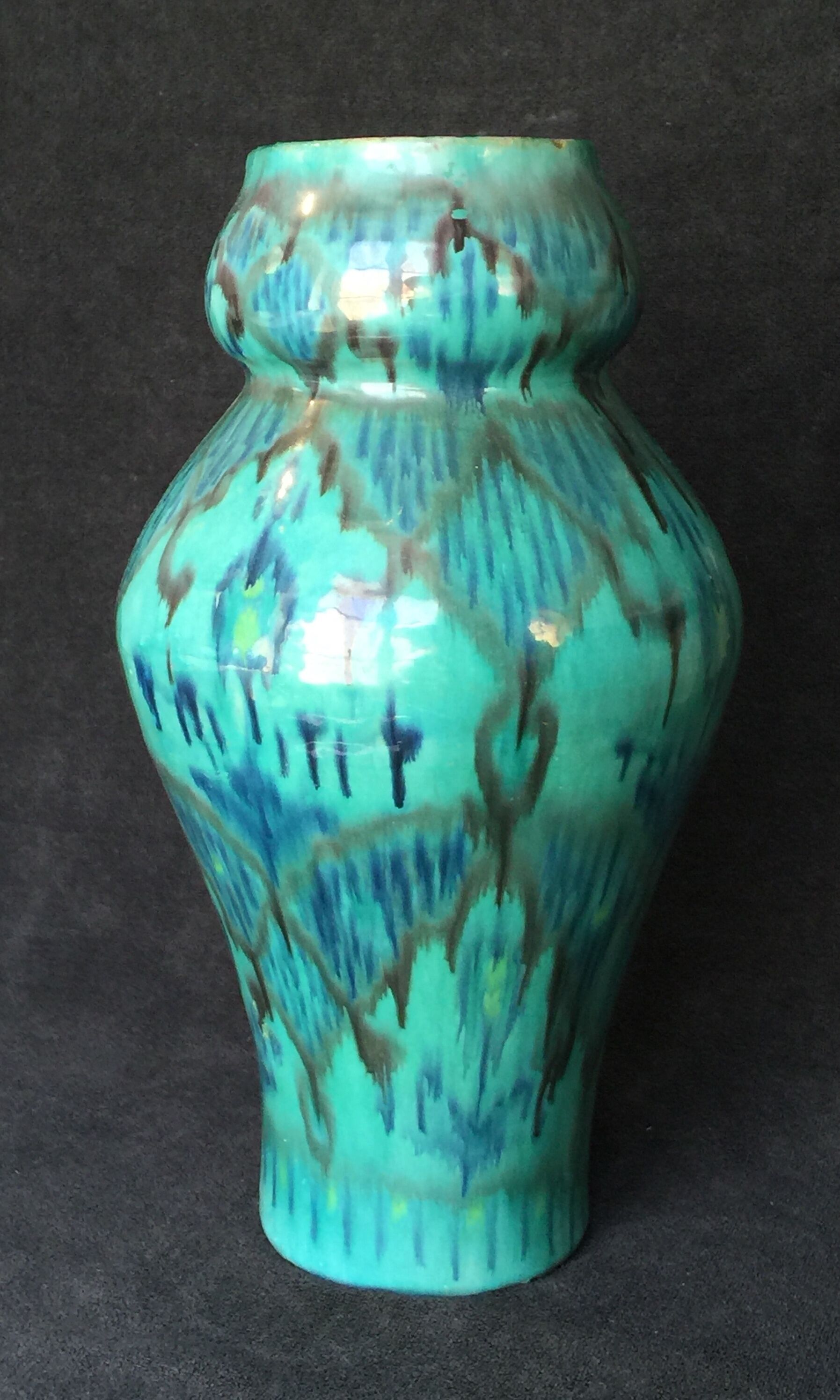 Enamelled ceramic vase, with a flaming blue-green décor