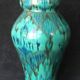 Enamelled ceramic vase, with a flaming blue-green décor