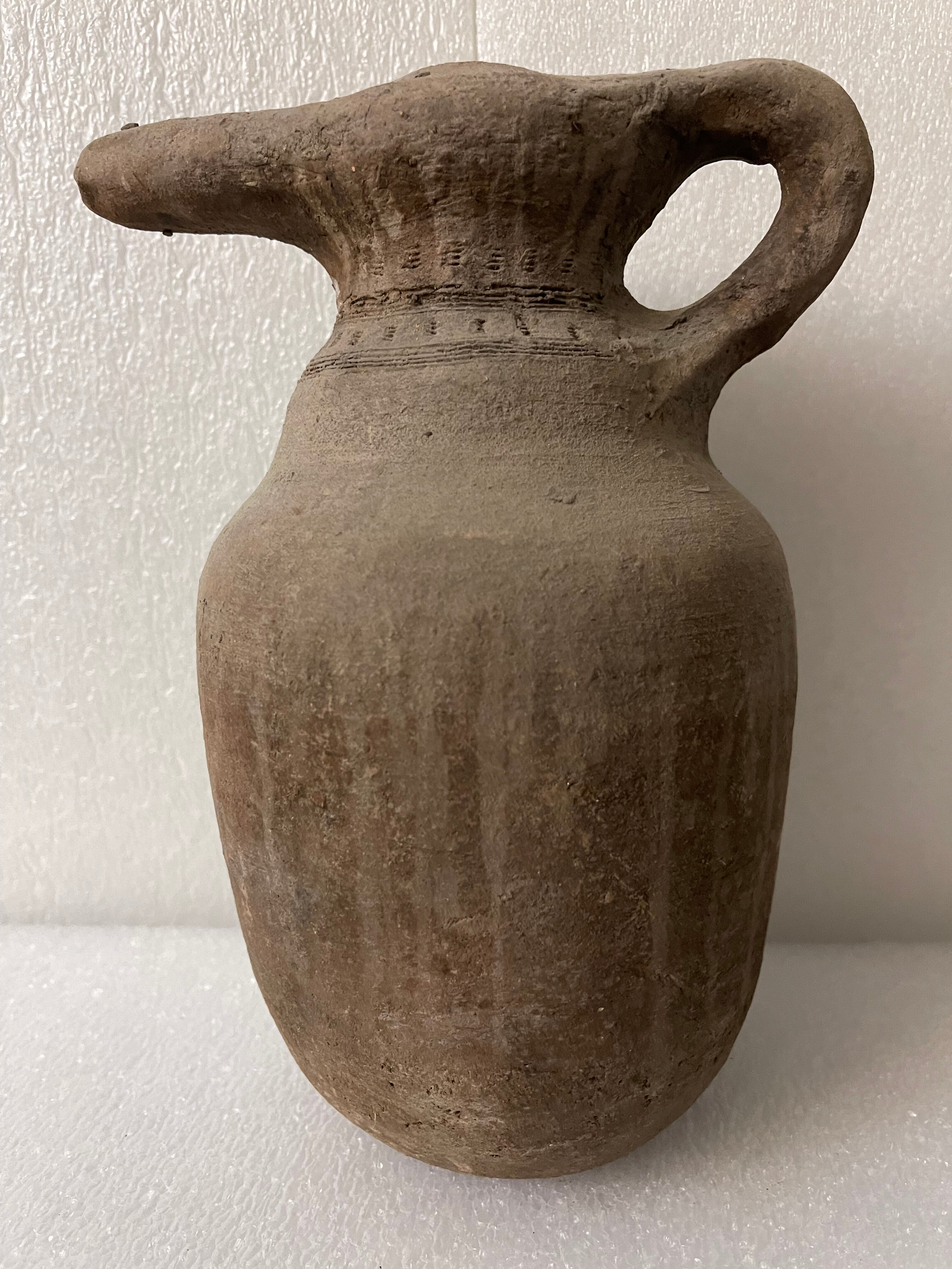 Zoomorphic pitcher with a beaked ancient Islamic ceramic birds