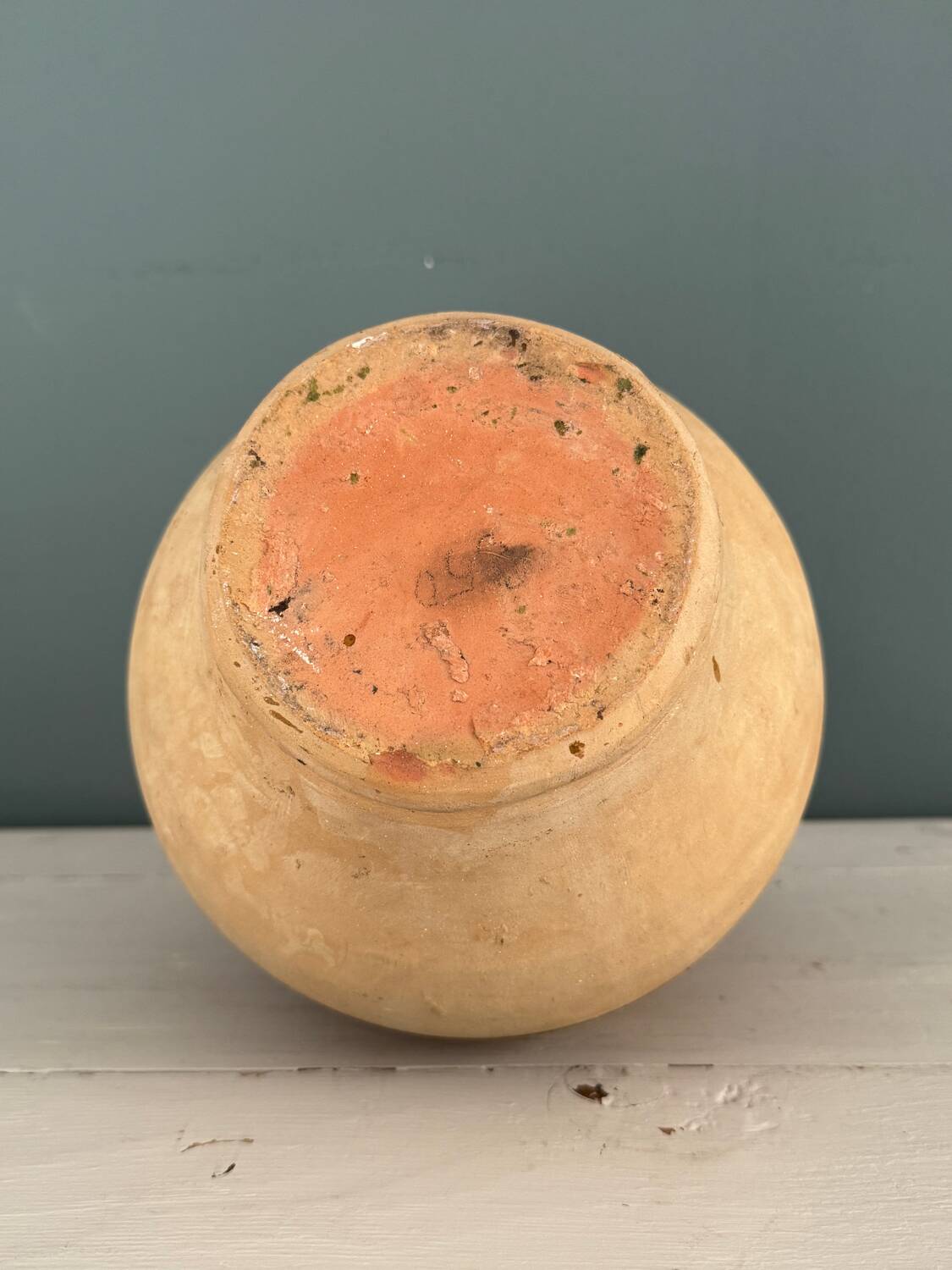 Old terracotta gargoulette jug