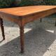 Antique Louis Philippe style farmhouse table in solid cherry wood with its 2 extensions.