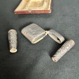 Art nouveau, silver metal smoking objects in case circa 1900